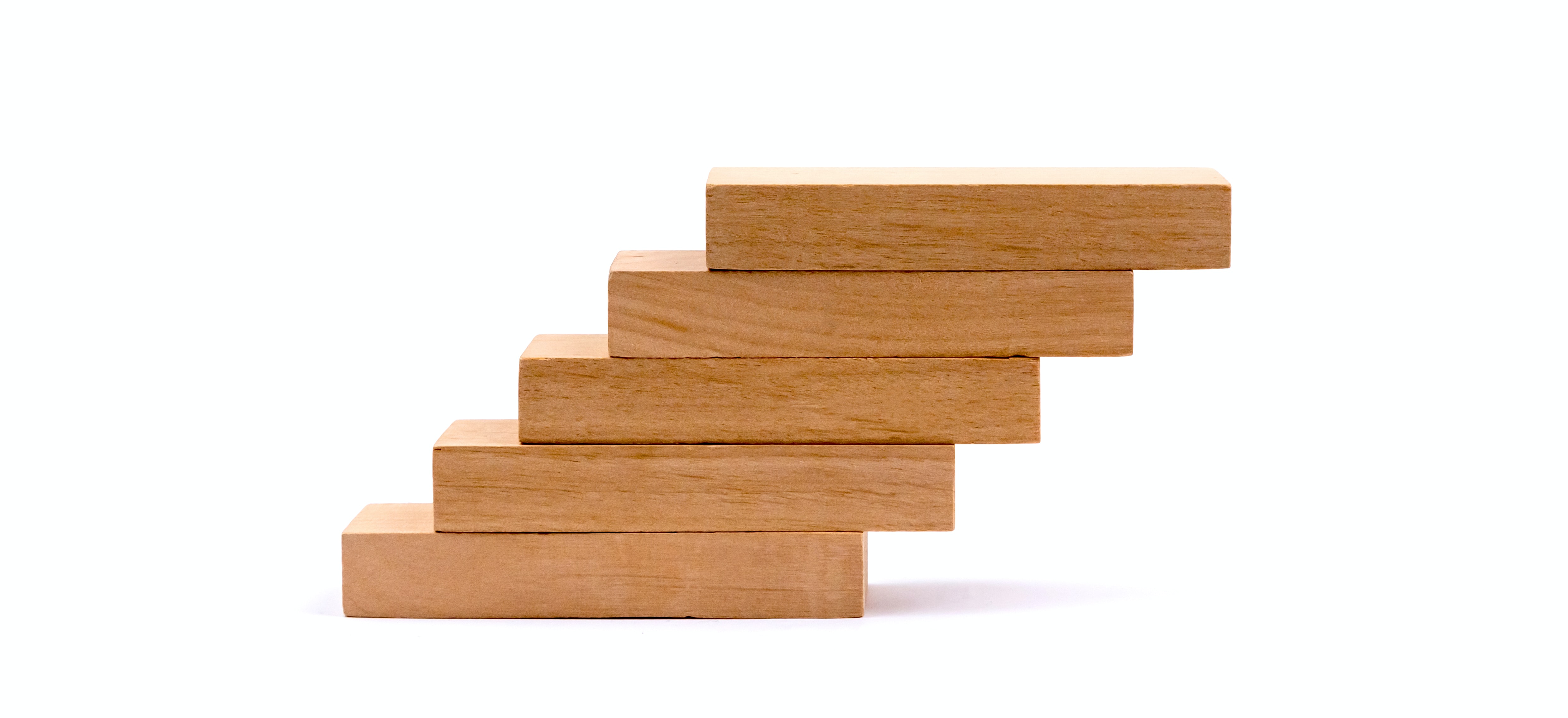 Blocks stacked on top of each other to resemble stairs.